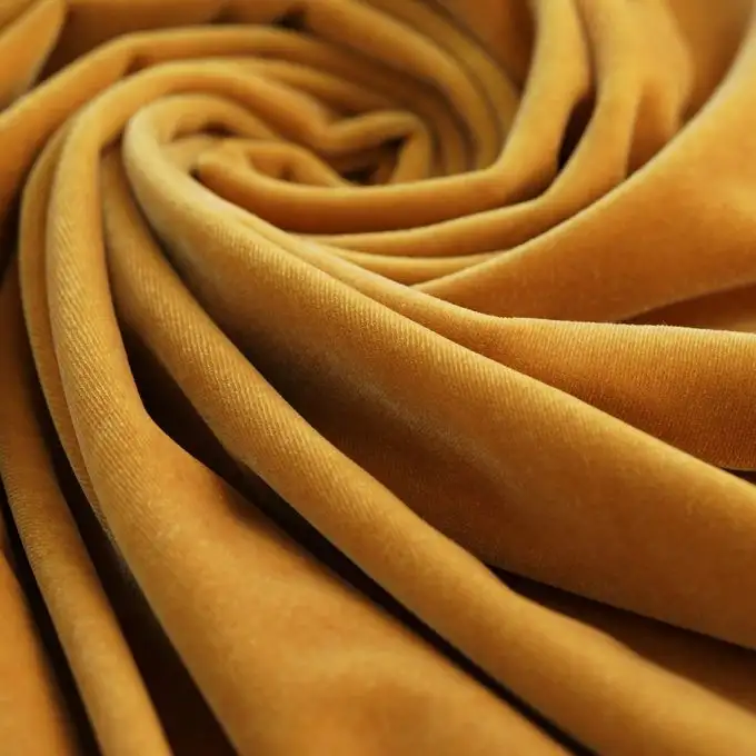 Velluto maglia tinta unita brillante dorato