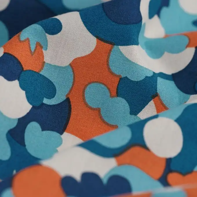 Tessuto cretonne bio mimetico arancione e blu