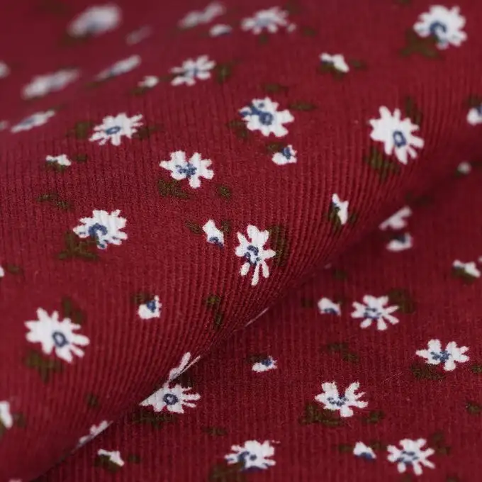 Velluto a coste sottili fiori sparsi bordeaux