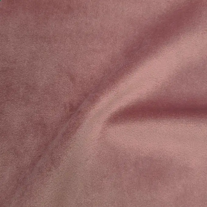 Velluto tessuto effetto pelle di pesca tinta unita rosa antico