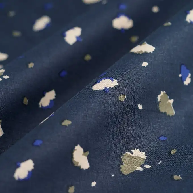 Tessuto cretonne fiori volanti blu navy
