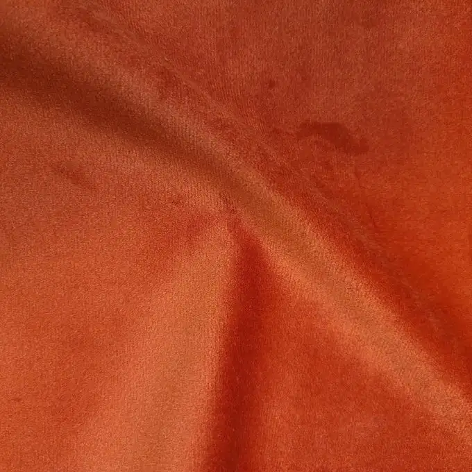 Velluto tessuto tocco pelle di pesca tinta unita arancione sanguigna