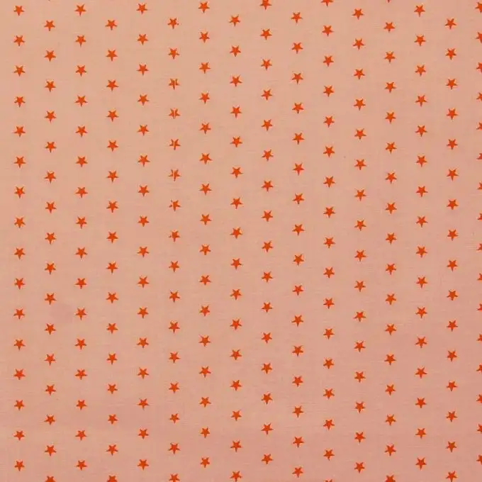 Velo cotone arancione pallido motivi stelle arancione sanguigna